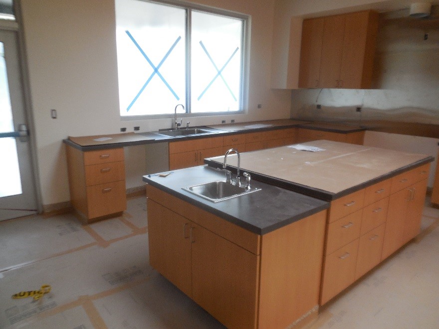 Kitchen cabinets and plumbing at Station 69