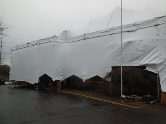 Tent covering Station 64 during construction