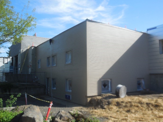 Exterior siding construction at Station 64